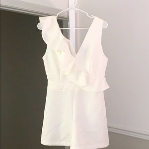 White romper with ruffle detail from LULU’S